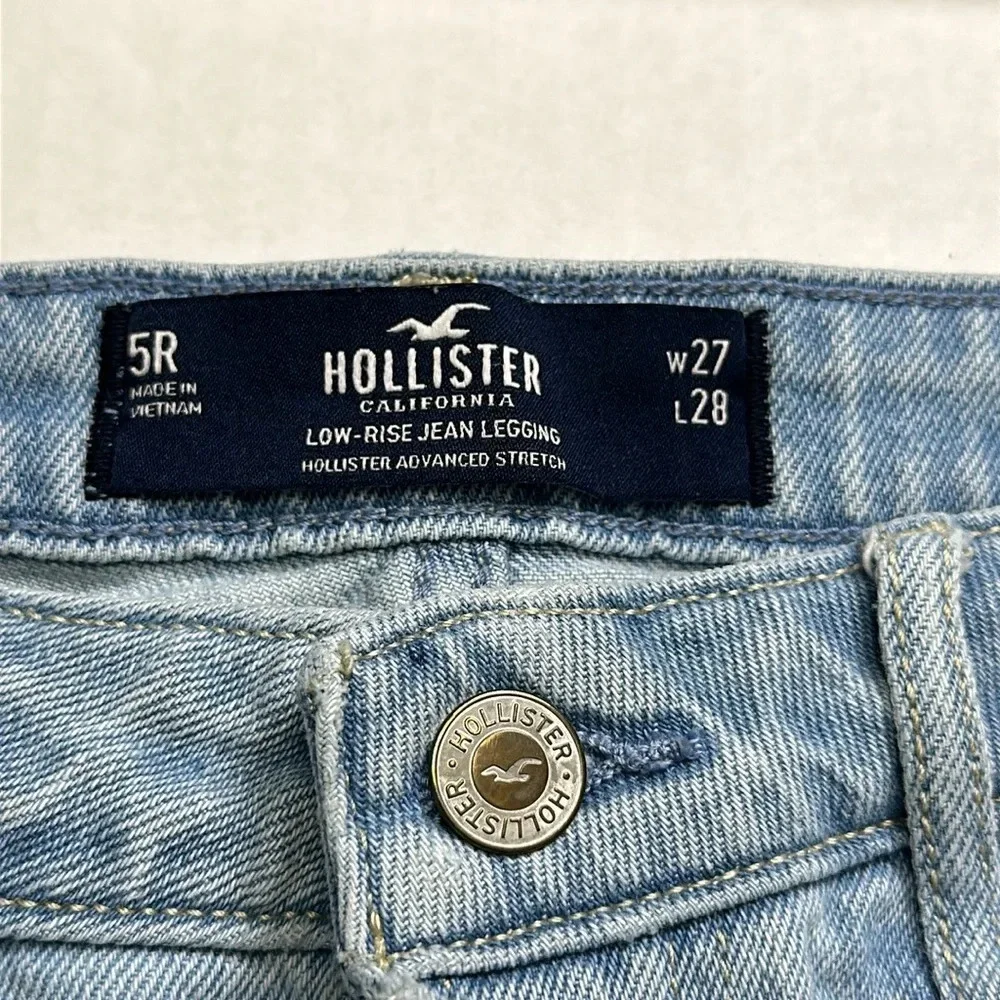 Hollister Womens Size 27 Low Rise Jean Legging Two Tone Denim Distressed Cut Off